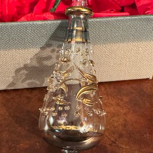 New Christmas glass ornament for tree. Maybe Murano glass with gold highlights or Egyptian glass. Ornamento per albero di Natale in vetro.